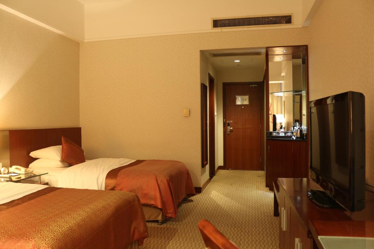 Hotel Jinling Jingyuan Plaza Nanking Exterior foto